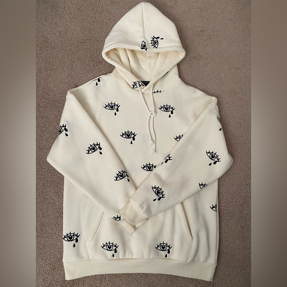 Forever 21 Cream Hoodie with Black Eye Print